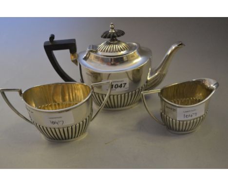 Walker & Hall three piece silver half fluted design bachelor tea service, Sheffield, 1896   CONDITION REPORT  Teapot is 8ins 