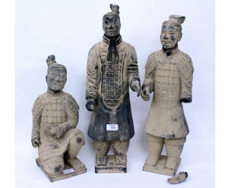 THREE CHINESE TERRACOTTA ARMY REPLICA FIGURES one seated and two standing, the largest 54cm in height (3)