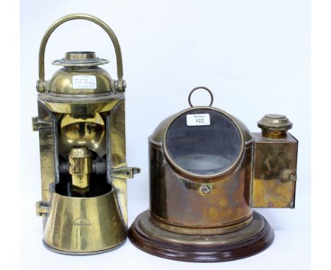 A VINTAGE BRASS CASED SHIP'S COMPASS 24cm wide and a Joseph Ratcliffe and Sons brass lantern, 38cm in height (2)