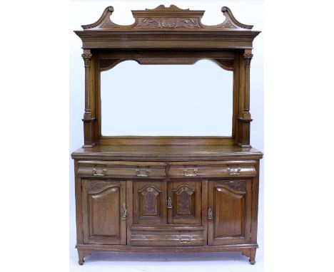 A LATE VICTORIAN OAK MIRROR BACKED SIDEBOARD with shaped pediment, turned tapering columns and standing on bracket feet, 149c