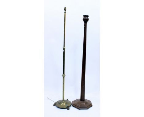 A LATE 19TH / EARLY 20TH CENTURY BRASS ADJUSTABLE STANDARD LAMP 163cm high and a mahogany standard lamp of octagonal column f