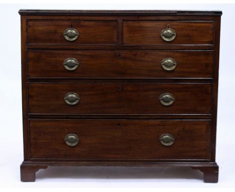A 19TH CENTURY MAHOGANY CHEST of two short and three long drawers with rosewood cross banded decoration to the top and bracke