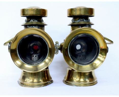 TWO BRASS AUTOMOBILE SIDE LAMPS by H & B, one a number 1007 the other a 1112, both approximately 23cm high 