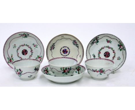 THREE 18TH CENTURY, POSSIBLY NEWHALL, TEABOWLS and saucers with a hand painted floral decoration, the smallest 12cm across (7
