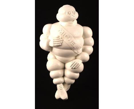 A large vintage sitting original bibendum Michelin Man display figure. Stamped made in France. 46cms tall. Please note this l