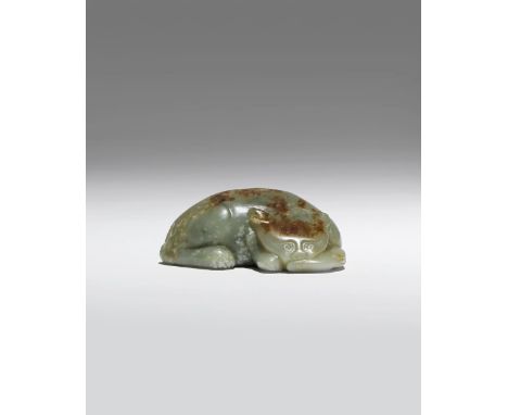 A CHINESE CELADON JADE CARVING OF A CAT AND MOUSE MING/QING DYNASTY The feline depicted crouching with its left paw resting o