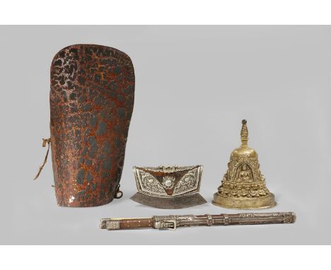 A COLLECTION OF TIBETAN ITEMS 15TH CENTURY AND LATER Comprising: a brass stupa, a small purse, a leather forearm guard and a 