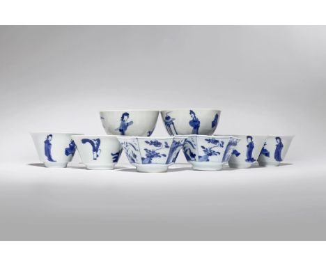 SIX SMALL CHINESE BLUE AND WHITE WINE CUPS AND A PAIR OF TEA BOWLS KANGXI 1662-1722 Comprising: a pair of flared wine cups de