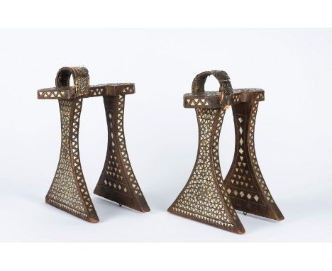 Islamic Art. A pair of luxuriant womanâ€™s mother-of-pearl inlaid wooden hammam clogs (Qabqab) with floral embossed silver mo