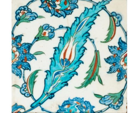 Islamic Art. Iznik tile painted with prunus flowers and saz leaves Ottoman Turkey, late 16th century  . Cm 25,00 x 25,00. 
