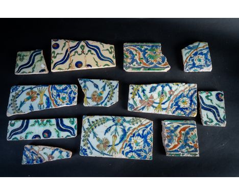 Islamic Art. Twelve Kutahya tile shreds painted with the four flowers and cintamani motif Ottoman Turkey, 18th-19th century. 