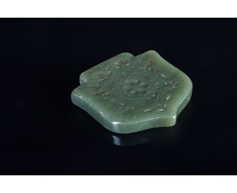 Islamic Art. A Timurid green jade pendant  Iran, 15th century . Provenance: ex Moscatelli collection, Rome.. Cm 4,20 x 4,20. 