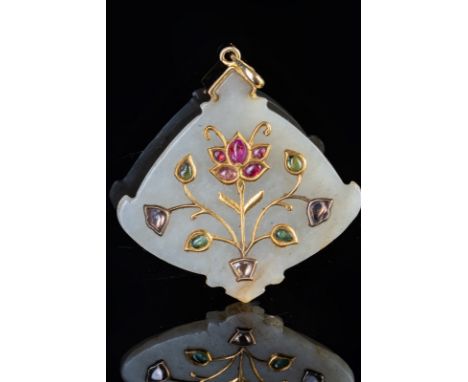 Himalayan Art. A jade pendant overlaid with gold 22 kt. set with rubies, emeralds and diamonds  India, 19th-20th century . Cm