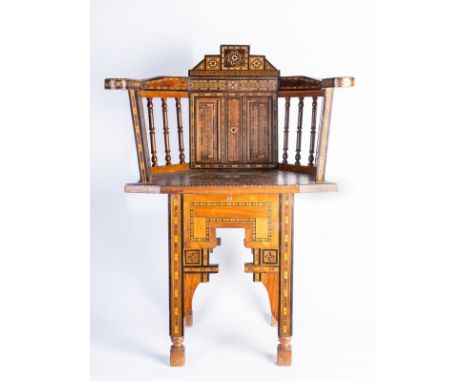 Islamic Art. A wooden armchair inlaid with bone and mother-of-pearl  Egypt, early 20th century . Cm 57,00 x 81,00 x 41,00. 