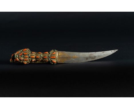 Islamic Art. An Ottoman Balkan dagger with scabbard and handle incrusted with coral and turquoise Ottoman empire, 19th centur