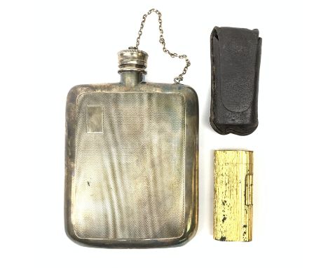 An Asprey silver plated hip flask, of rounded rectangular form with engine turned panel decoration to the front and back, the