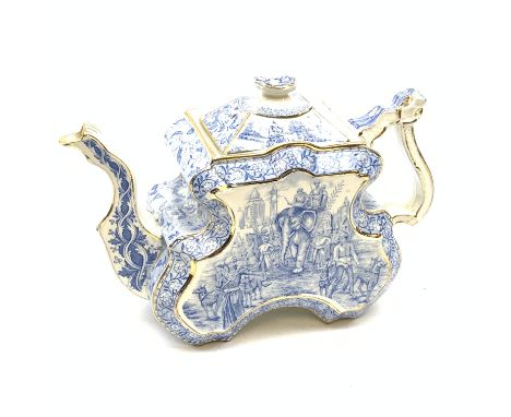 A Victorian Burgess and Leigh Aesthetic style blue and white teapot, decorated with an Indian hunting scene and heightened wi
