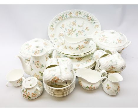 A selection of Wedgwood Cottage Ruse pattern dinner and teawares, comprising an oval serving platter, two tureen and covers,