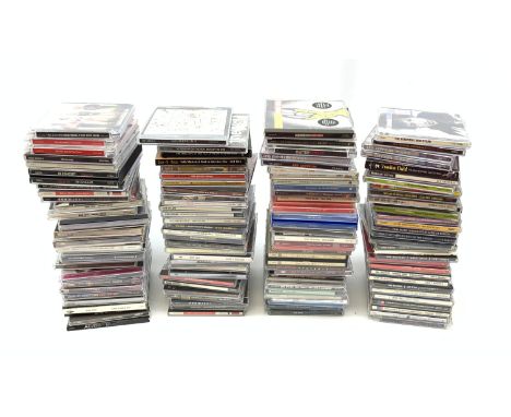 A collection of approximately one hundred and fifteen CD's, to include examples by ACDC, The Velvet Underground, Guns &amp; R