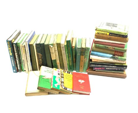  Forty cricket books including signed copy of Herbert Sutcliffe How To Become A First Class Batsman 1949, scrap album entitle