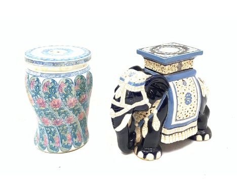 A Chinese garden seat, of baluster form with circular top, decorated with pink and blue stylised bands of flowers, H42cm, tog