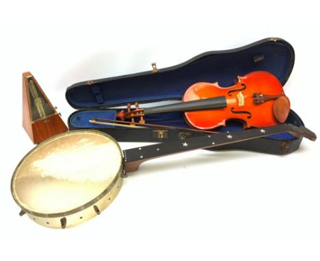  A cased Stentor Student violin and bow, together with a J E Dallas banjo with inlaid mother of pearl star and disc marker de