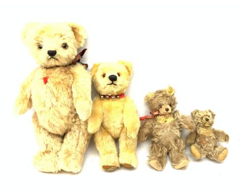  A group of four teddy bears, to include a small Steiff example with button to ear, and a Chad Valley example with label to f