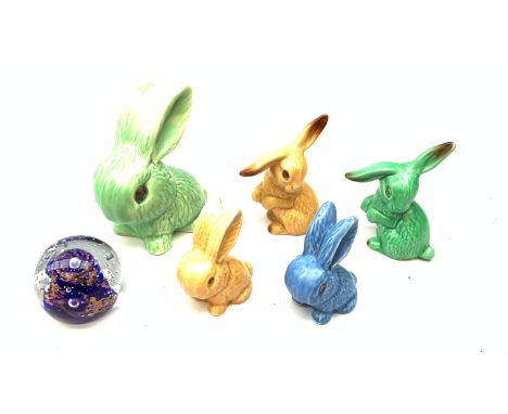  Five Sylvac Rabbits, to include a large example marked 1026, etc., together with a Caithness glass paperweight.    - Conditi