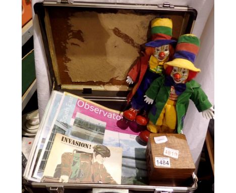 Briefcase containing ceramic clowns, wooden box and ephemera. Not available for in-house P&amp;P
