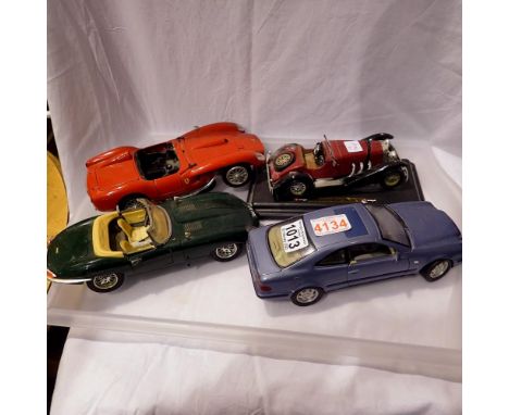 Four Bburago 1/18th scale cars. Not available for in-house P&amp;P 