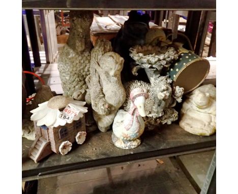Shelf of mixed garden ornaments. Not available for in-house P&amp;P 