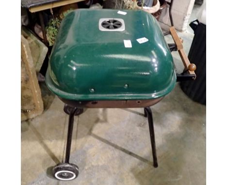 Free standing lidded garden barbecue, with tools and briquettes. Not available for in-house P&amp;P