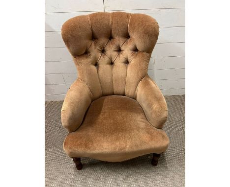 A low button back chair