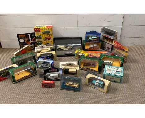 A large selection of model cars to include Corgi Vanguards and a Franklin Mint Jaguar SS-100