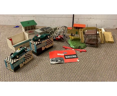 A selection of Vintage Scalextric equipment to include cars , transformer etc 