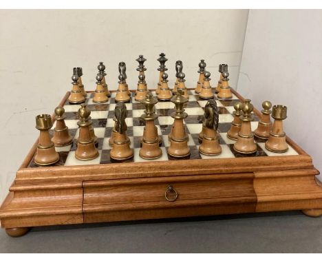 A large Italian marble topped chess board with light oak pieces