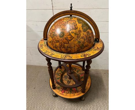 A Globe, revolving drinks stand.