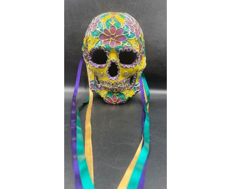 A Venetian Mask in the shape of a skull, signed by artist.