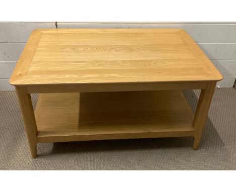 A light oak coffee table with shelf under (H46cm W90cm D60cm)