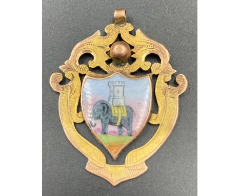 A 9ct gold shield shaped pendant with enamel elephant to center (Approximate Weight 6.4g), hallmarked for Birmingham, makers 