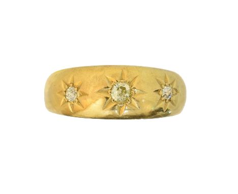 A diamond three stone ring, A diamond three stone ring, the old cut diamond line star set to the tapered band, estimated tota