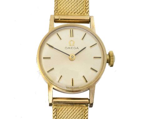 A 9ct gold Omega wristwatch, A 9ct gold Omega wristwatch, cal. 620, the signed dial with baton markers, signed 17 jewel manua