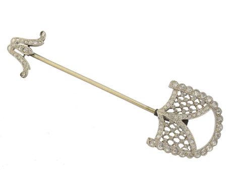 An early 20th century diamond jabot pin, An early 20th century diamond jabot pin, designed as a stylised arrow, set throughou