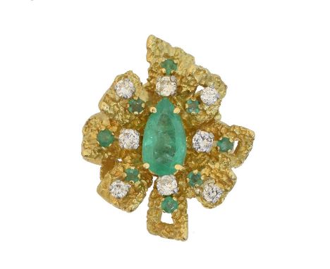 A 1970s French emerald and diamond cluster ring, A 1970s French emerald and diamond cluster ring, the pear shape emerald and 