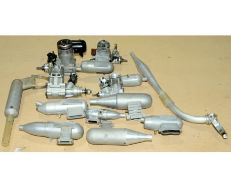 OS Max &amp; Similar an unboxed group of model engines and other items (see photo). Conditions appear to be generally Fair to