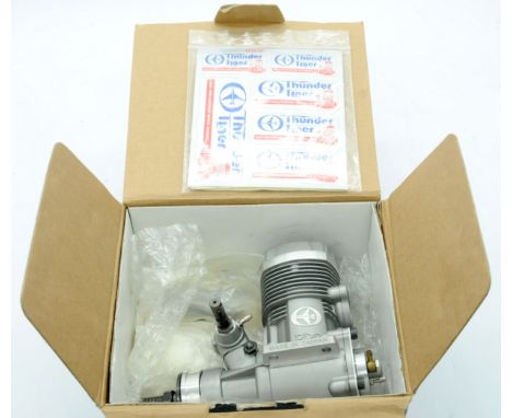 Thunder Tiger a boxed 120RP model engine. Condition appears to be generally Excellent (unchecked for completeness and unteste