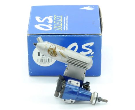 OS Max a boxed 10LA model engine. Condition appears to be generally Good with some oil/petrol staining (unchecked for complet