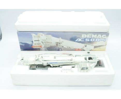 Conrad a boxed 1:50 Scale No.2095/0 Demag AC500-1 Telescopic Crane. Condition is generally Good to Excellent (unchecked for c