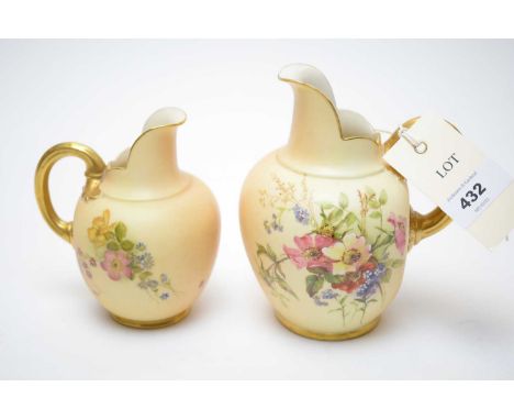 A graduated pair of Royal Worcester blush ivory water jugs, each decorated with floral bouquets, pattern No. 1094, the taller