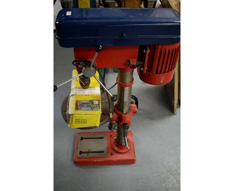 A NU-Tools bench mounting 12-speed drill press, model no. NT-015 G, in red; together with associated attachment. 
